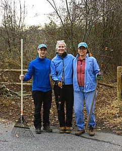 Staff member Laura Kelm, volunteer Karen Witt, and board member Lisa Stevens