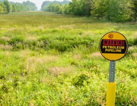 Petroleum pipeline warning sign and right-of-way